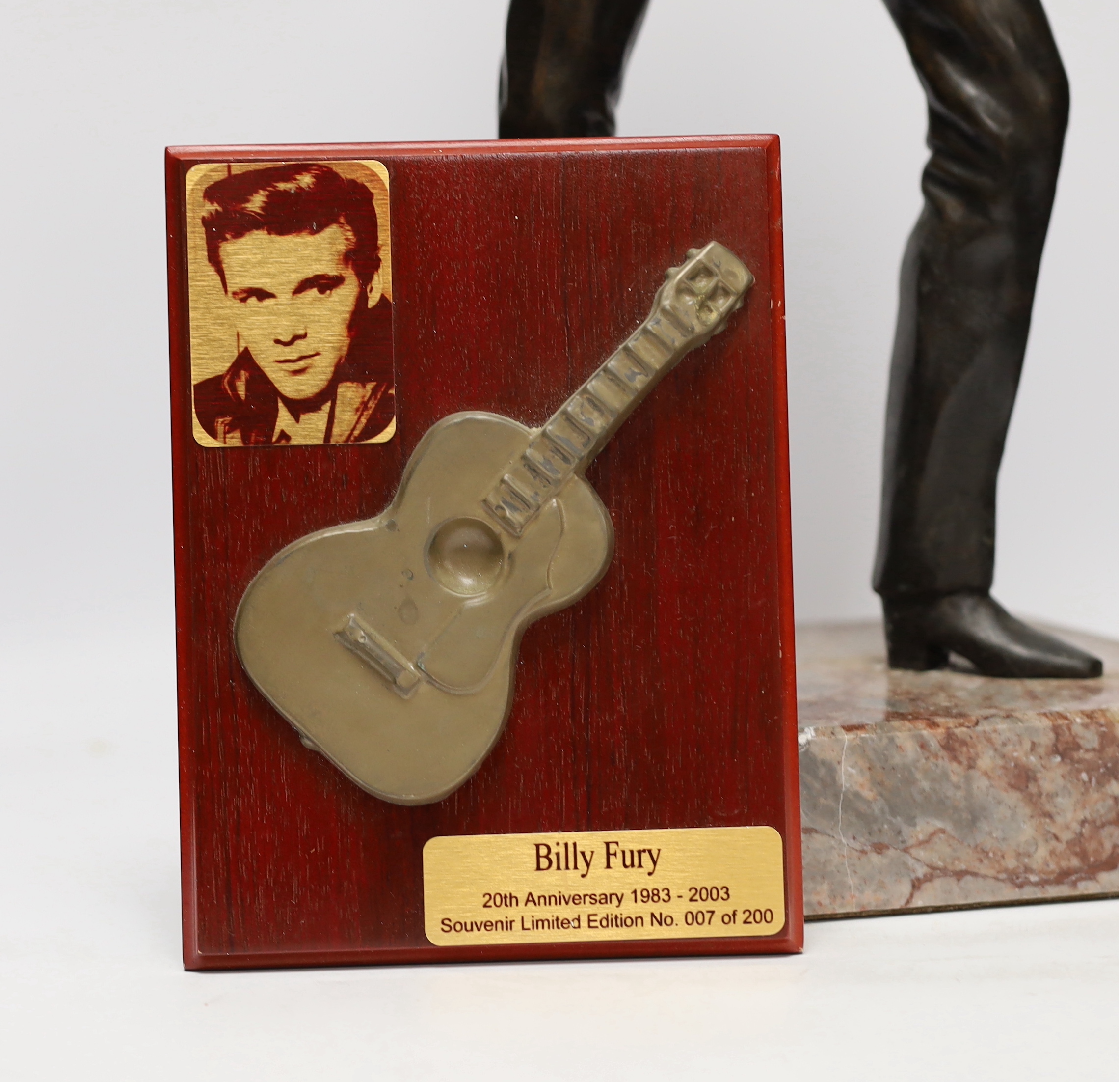 A bronze statue of Billy Fury, one of five cast by Tom Murphy, based on the public statue at the Albert Dock, Liverpool, together with a limited edition plaque, produced and sold to raise money to fund the installation o